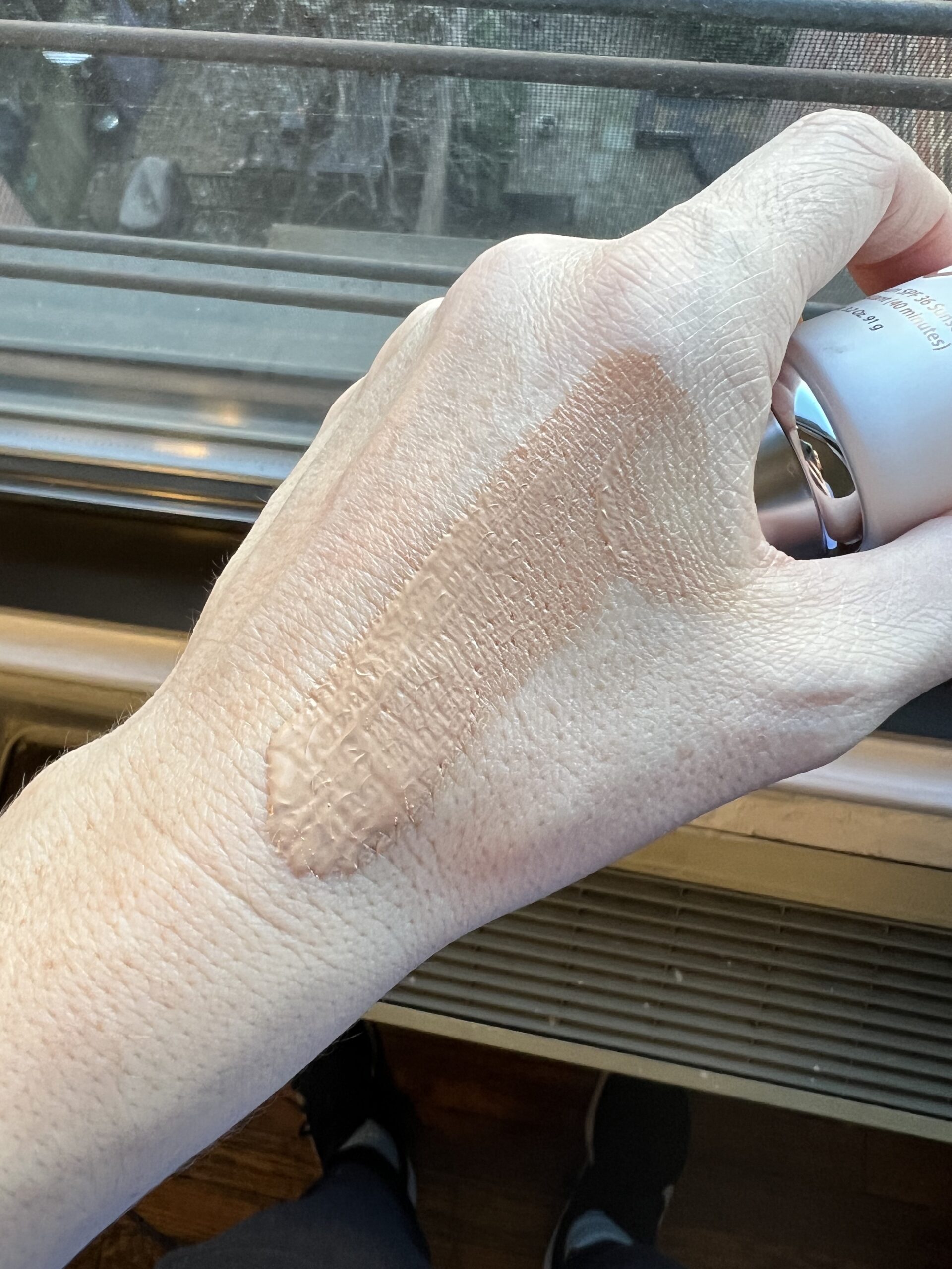 Alastin Sunscreen swatch on hand Alastin Sunscreen swatch on hand