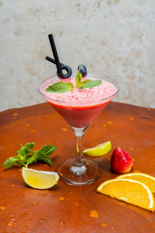 frozen strawberry lemonade A martini glass full of a frozen strawberry lemonade, one of the best summer mocktails